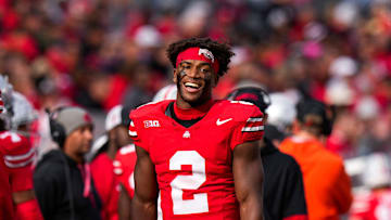Ohio State safety Caleb Downs smiles during a game against Purdue.