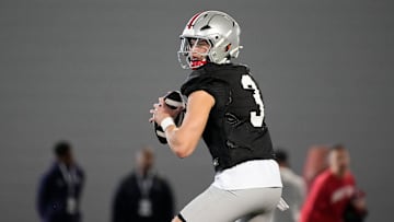 Ohio State Buckeyes quarterback Lincoln Kienholz (3) takes a snap during spring football practice at the Woody Hayes Athletic Center on March 17, 2025.