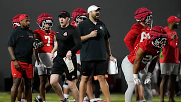 Ohio State Buckeyes assistants Keenan Bailey and Tyler Bowen run players through drills during spring football practice at the Woody Hayes Athletic Center in Columbus on March 19, 2025.