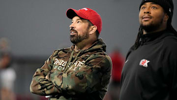 Ohio State Buckeyes head coach Ryan Day admires the new banners on the wall alongside Tyliek Williams during spring football practice at the Woody Hayes Athletic Center on March 17, 2025.