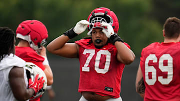 Ohio State Buckeyes offensive lineman Phillip Daniels (70) warms up during the first football practice of the season at the Woody Hayes Athletic Center on July 31, 2025.