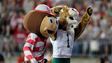Ohio State Buckeyes mascot Brutus and Ohio Bobcats mascot Rufus interact during the first half of the NCAA football game at Ohio Stadium on Sept. 13, 2025.