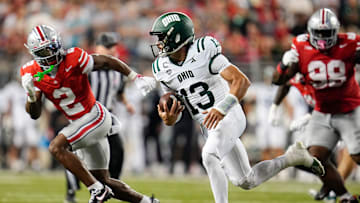 Ohio State Buckeyes safety Caleb Downs (2) pursues Ohio Bobcats quarterback Parker Navarro (13) during the second half of the NCAA football game at Ohio Stadium on Sept. 13, 2025. Ohio State won 37-9.