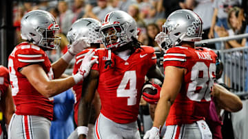Ohio State Buckeyes wide receiver Jeremiah Smith (4) celebrates a touchdown during the NCAA football game against the Ohio Bobcats at Ohio Stadium on Sept. 13, 2025. Ohio State won 37-9.