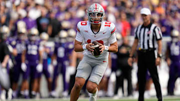 Ohio State Buckeyes quarterback Julian Sayin (10) runs during the first half of the NCAA football game against the Washington Huskies at Husky Stadium in Seattle on Sept. 27, 2025.