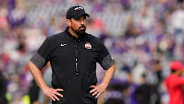 Ohio State Buckeyes head coach Ryan Day watches warm ups prior to the NCAA football game against the Washington Huskies at Husky Stadium in Seattle on Sept. 27, 2025.