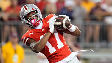 Ohio State Buckeyes wide receiver Carnell Tate (17) catches a touchdown pass during the first half of the NCAA football game against the Minnesota Golden Gophers at Ohio Stadium in Columbus on Oct. 4, 2025.