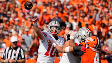 Ohio State Buckeyes quarterback Julian Sayin (10) throws during the first half of the NCAA football game against the Illinois Fighting Illini at Gies Memorial Stadium in Champaign on Oct. 11, 2025.