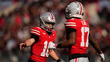 Ohio State Buckeyes quarterback Julian Sayin (10) celebrates a pass to wide receiver Carnell Tate (17) during the NCAA football game against the Penn State Nittany Lions at Ohio Stadium in Columbus on Nov. 1, 2025.