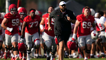 Ohio State Buckeyes offensive line coach Tyler Bowen runs during football training camp at the Woody Hayes Athletic Center on Aug. 1, 2025.