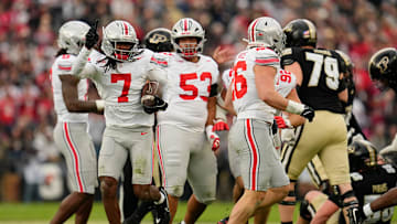 Ohio State Buckeyes cornerback Jermaine Mathews Jr. (7) celebrates an interception during the NCAA football game against the Purdue Boilermakers at Ross-Ade Stadium in West Lafayette, Ind. on Nov. 8, 2025. Ohio State won 34-10.