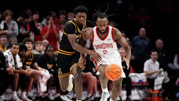 Ohio State Buckeyes guard Bruce Thornton (2) is fouled after stealing the ball from Appalachian State Mountaineers guard Eren Banks (4) during the NCAA men's basketball game at Value City Arena in Columbus on Nov. 11, 2025. Ohio State won 75-53.