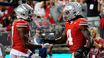 Ohio State Buckeyes wide receiver Carnell Tate (17) celebrates a touchdown by wide receiver Jeremiah Smith (4) during the first half of the NCAA football game against the Minnesota Golden Gophers at Ohio Stadium in Columbus on Oct. 4, 2025.