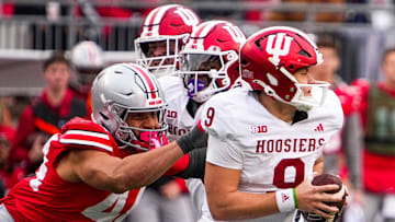 Ohio State Buckeyes defensive end JT Tuimoloau (44) sacks Indiana Hoosiers quarterback Kurtis Rourke (9) in the second half at Ohio Stadium on Saturday, Nov. 23, 2024 in Columbus, Ohio.