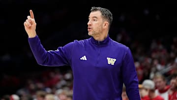 Washington Huskies head coach Danny Sprinkle motions to his team during the first half of the NCAA men's basketball game against the Ohio State Buckeyes at Value City Arena in Columbus on Feb. 12, 2025.