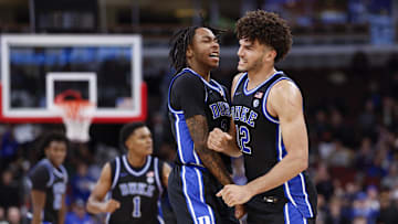 Nov 27, 2025; Chicago, Illinois, USA; Duke basketball forward Cameron Boozer (12) celebrates with guard Isaiah Evans (3) during the second half at United Center.
