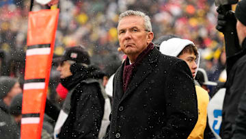 Former head coach Urban Meyer watches from the sideline during the NCAA football game between the Michigan Wolverines and the Ohio State Buckeyes at Michigan Stadium in Ann Arbor, Mich. on Nov. 29, 2025. Ohio State won 27-9.