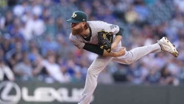 May 8, 2024; Seattle, Washington, USA; Oakland Athletics starter Paul Blackburn (58) delivers a pitch during the second inning against the Seattle Mariners at Lumen Field. Mandatory Credit: Stephen Brashear-USA TODAY Sports