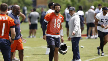 Jun 5, 2024; Lake Forest, IL, USA; Chicago Bears quarterback Caleb Williams (18) looks on during the team's minicamp at Halas Hall. Mandatory Credit: Kamil Krzaczynski-USA TODAY Sports