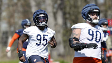 May 9, 2025; Lake Forest, IL, USA; Chicago Bears defensive line Shemar Turner (95) warms up during the Rookie Minicamp at Halas Hall. Mandatory Credit: Kamil Krzaczynski-Imagn Images