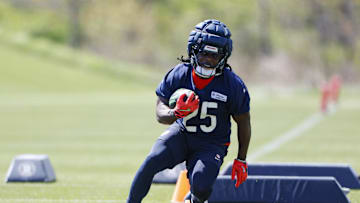 May 9, 2025; Lake Forest, IL, USA; Chicago Bears running back Kyle Monangai (25) runs with the ball during the Rookie Minicamp at Halas Hall. Mandatory Credit: Kamil Krzaczynski-Imagn Images