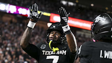 Oct 4, 2025; College Station, Texas, USA; Texas A&M Aggies wide receiver KC Concepcion (7) reacts after scoring a touchdown during the third quarter against the Mississippi State Bulldogs at Kyle Field. Mandatory Credit: Maria Lysaker-Imagn Images 