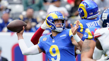 Oct 17, 2021; East Rutherford, New Jersey, USA;  
Los Angeles Rams quarterback Matthew Stafford (9) throws against the New York Giants in the 1st half at MetLife Stadium. Mandatory Credit: Robert Deutsch-Imagn Images