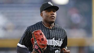 Aug 25, 2023; Chicago, Illinois, USA; Chicago White Sox right fielder Oscar Colas (22) looks on as he returns to dugout during the first inning of a baseball game against the Oakland Athletics at Guaranteed Rate Field. Mandatory Credit: Kamil Krzaczynski-Imagn Images
