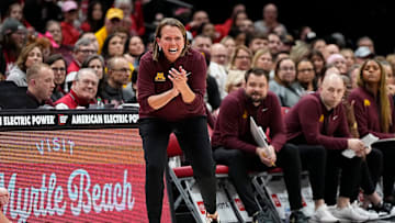 Minnesota Golden Gophers head coach Dawn Plitzuweit cheers on her team during the second half of the NCAA women's basketball game against the Ohio State Buckeyes at Value City Arena in Columbus on Feb. 13, 2025. Ohio State won 87-84 in overtime.