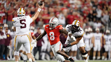 Ohio State Buckeyes linebacker Arvell Reese (8) pressures Minnesota Golden Gophers quarterback Drake Lindsey (5) during the first half of the NCAA football game at Ohio Stadium in Columbus on Oct. 4, 2025.