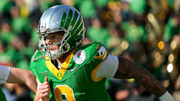 Oregon Ducks quarterback Dillon Gabriel (8) warms up prior to the College Football Playoff quarterfinal against the Ohio State Buckeyes at the Rose Bowl in Pasadena, Calif. on Jan. 1, 2025.