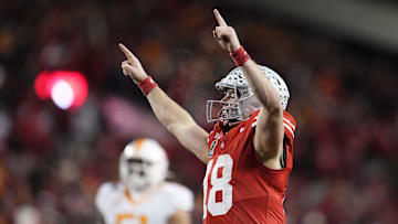 Dec 21, 2024; Columbus, Ohio, USA; Ohio State Buckeyes quarterback Will Howard (18) celebrates after a touchdown by running back TreVeyon Henderson (not pictured) against the Tennessee Volunteers during the second half of the College Football Playoff first round game at Ohio Stadium. Ohio State won 42-17. Mandatory Credit: Adam Cairns-Imagn Images