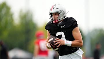 Ohio State Buckeyes quarterback Lincoln Kienholz (3) takes a snap during the first football practice of the season at the Woody Hayes Athletic Center on July 31, 2025.