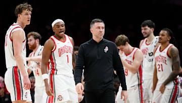 Ohio State Buckeyes head coach Jake Diebler gathers his team for a timeout during the NCAA preseason exhibition game against the Ohio Bobcats at Value City Arena in Columbus on Oct. 26, 2025. Ohio State won 103-74.