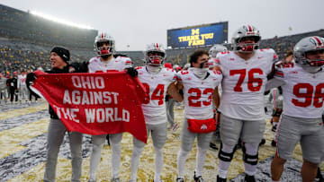 Ohio State Buckeyes players celebrate following the NCAA football game against the Michigan Wolverines at Michigan Stadium in Ann Arbor, Mich. on Nov. 29, 2025. Ohio State won 27-9.