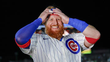 May 13, 2025; Chicago, Illinois, USA; Chicago Cubs first baseman Justin Turner (3) smiles after hitting a walk-off two-run double against the Miami Marlins during the ninth inning at Wrigley Field. Mandatory Credit: Kamil Krzaczynski-Imagn Images