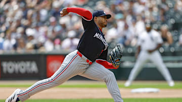 Aug 24, 2025; Chicago, Illinois, USA; Minnesota Twins starting pitcher Taj Bradley (26) delivers a pitch against the Chicago White Sox during the first inning at Rate Field. Mandatory Credit: Kamil Krzaczynski-Imagn Images