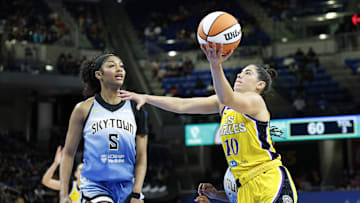 Jun 24, 2025; Chicago, Illinois, USA; Chicago Sky center Kamilla Cardoso (10) goes to the basket against Chicago Sky forward Angel Reese (5) during the second half at Wintrust Arena. Mandatory Credit: Kamil Krzaczynski-Imagn Images