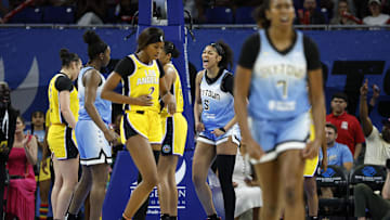 Jun 24, 2025; Chicago, Illinois, USA; Chicago Sky forward Angel Reese (5) reacts after scoring against the Los Angeles Sparks during the second half at Wintrust Arena. Mandatory Credit: Kamil Krzaczynski-Imagn Images