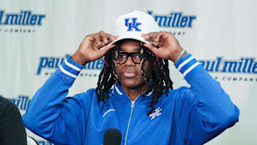 Jasper Johnson, a Lexington native and one of the top basketball players in the 2025 high school class, announces his commitment to the University of Kentucky during a ceremony at the Woodford County High School in Versailles, Ky. on Sep. 5, 2024.