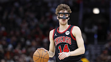Dec 6, 2024; Chicago, Illinois, USA; Chicago Bulls forward Matas Buzelis (14) brings the ball up court against the Indiana Pacers during the second half at United Center. Mandatory Credit: Kamil Krzaczynski-Imagn Images