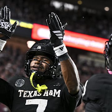 Oct 4, 2025; College Station, Texas, USA; Texas A&M Aggies wide receiver KC Concepcion (7) reacts after scoring a touchdown during the third quarter against the Mississippi State Bulldogs at Kyle Field. Mandatory Credit: Maria Lysaker-Imagn Images 