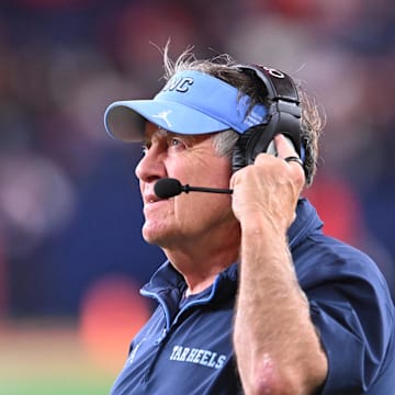 Oct 31, 2025; Syracuse, New York, USA; North Carolina Tar Heels head coach Bill Belichick looks to the clock in the fourth quarter game against the Syracuse Orange at the JMA Wireless Dome. 
