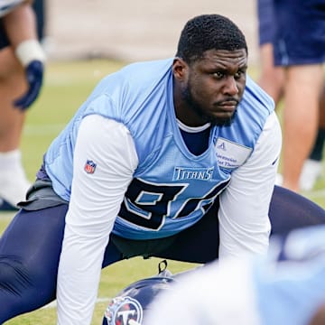 Tennessee Titans defensive tackle Jaleel Johnson (94) stretches during an OTA practice at Ascension Saint Thomas Sports Park in Nashville, Tenn., Wednesday, May 31, 2023.