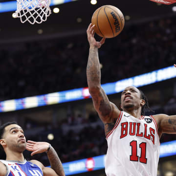 Feb 3, 2024; Chicago, Illinois, USA; Chicago Bulls forward DeMar DeRozan (11) goes to the basket against the Sacramento Kings during the first half at United Center. Mandatory Credit: Kamil Krzaczynski-USA TODAY Sports
