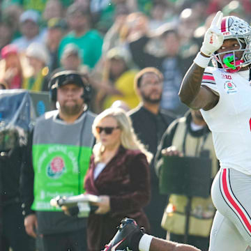 Ohio State receiver Jeremiah Smith scores a touchdown against Oregon on Jan. 1.