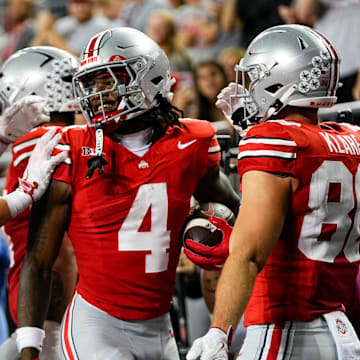 Ohio State Buckeyes wide receiver Jeremiah Smith (4) celebrates a touchdown during the NCAA football game against the Ohio Bobcats at Ohio Stadium on Sept. 13, 2025. Ohio State won 37-9.
