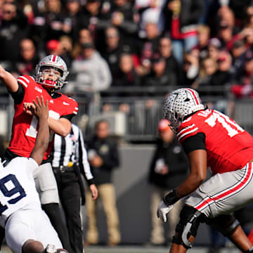 Ohio State Buckeyes quarterback Julian Sayin (10) throws a long touchdown pass to Carnell Tate during the NCAA football game against the Penn State Nittany Lions at Ohio Stadium in Columbus on Nov. 1, 2025.