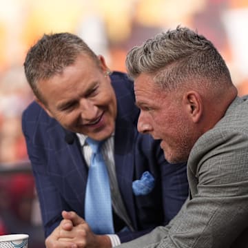 Pat McAfee, right, talks to Kirk Herbstreit on the set of ESPN College GameDay prior to the NCAA football game between the Ohio State Buckeyes and the Texas Longhorns at Ohio Stadium on Aug. 30, 2025.