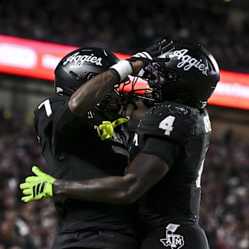 Oct 4, 2025; College Station, Texas, USA; Texas A&M Aggies wide receiver KC Concepcion (7) celebrates with running back Rueben Owens II (4) after scoring a touchdown during the third quarter against the Mississippi State Bulldogs at Kyle Field. Mandatory Credit: Maria Lysaker-Imagn Images 